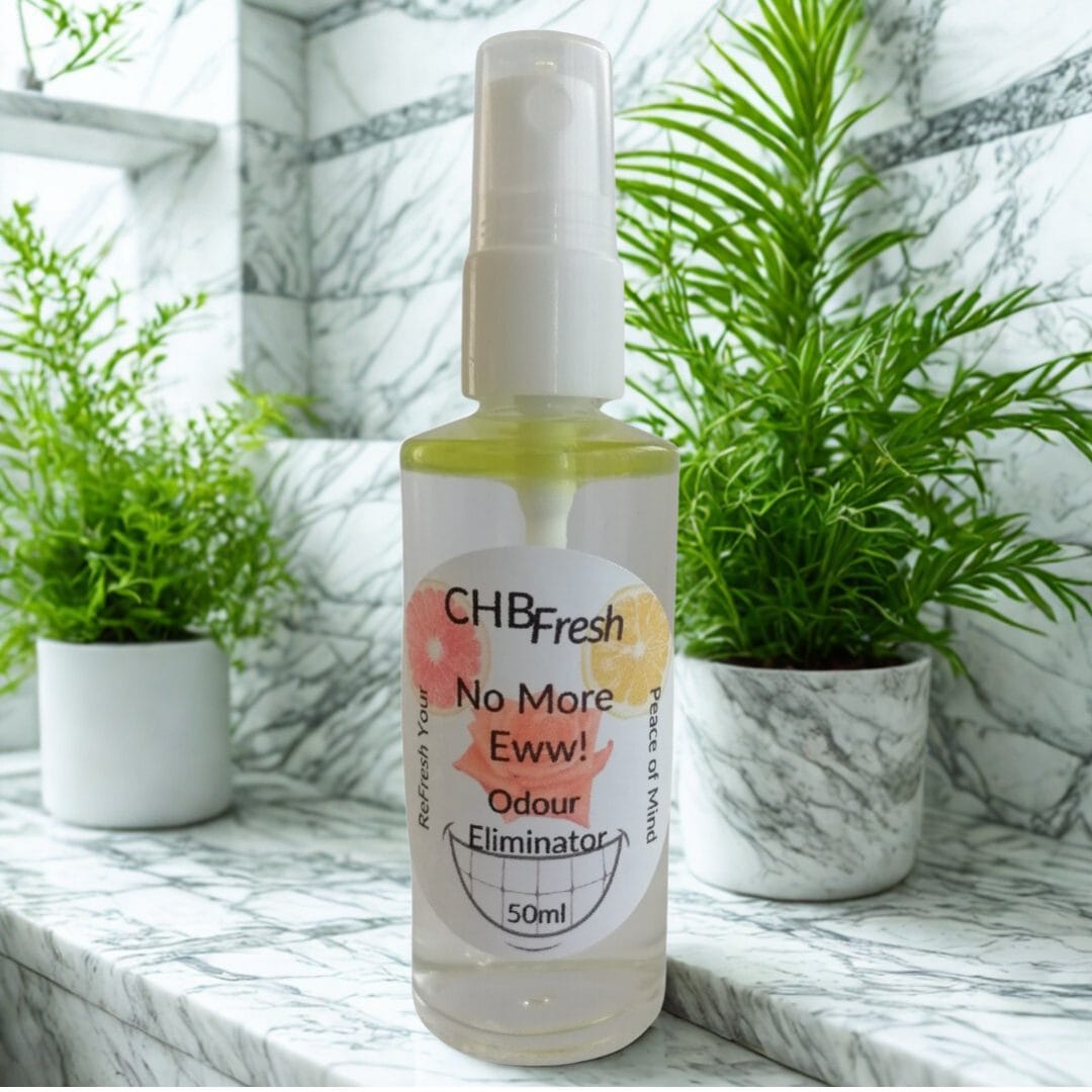No more Eww on a shelf in a marble bathroom with plants in the background